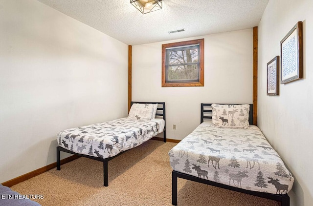 1293 Laurel Lick Rd, Sevierville, TN 37862 - carpeted bedroom with a textured ceiling