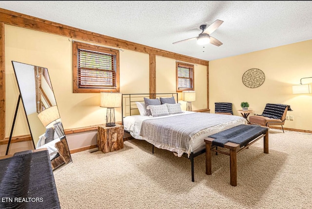 1293 Laurel Lick Rd, Sevierville, TN 37862 - bedroom with carpet, baseboards, a textured ceiling, and a ceiling fan