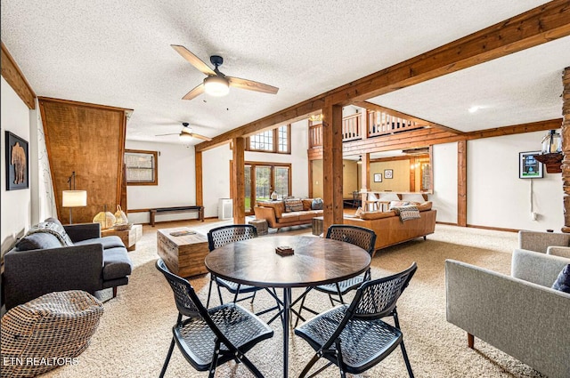 1293 Laurel Lick Rd, Sevierville, TN 37862 - dining space with carpet flooring, a textured ceiling, ceiling fan, and a baseboard radiator