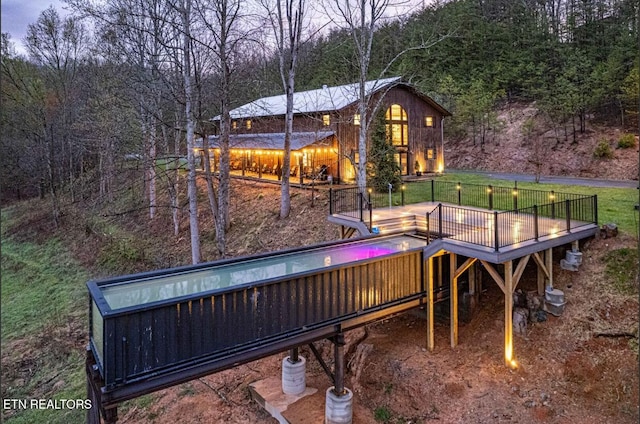 1293 Laurel Lick Rd, Sevierville, TN 37862 - view of play area featuring a wooden deck and a view of trees