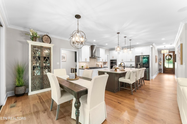 101 Dudala Way, Loudon, TN 37774 - dining room featuring a chandelier, crown molding, recessed lighting, and light wood finished floors