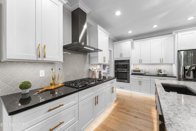 101 Dudala Way, Loudon, TN 37774 - kitchen with wall chimney exhaust hood, appliances with stainless steel finishes, white cabinets, recessed lighting, and dark stone counters