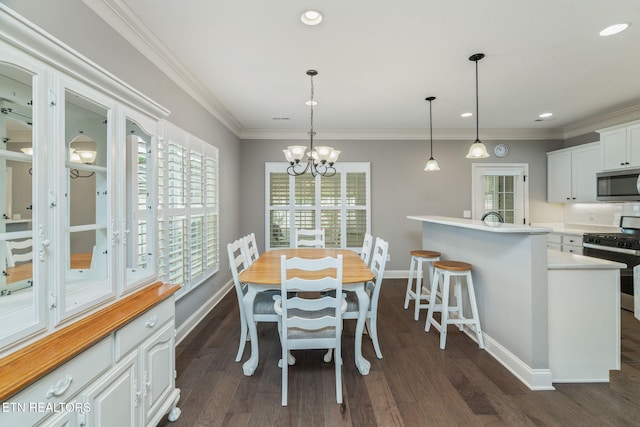 128 Hackberry St, Oak Ridge, TN 37830 - dining room featuring a chandelier, baseboards, dark wood finished floors, recessed lighting, and ornamental molding