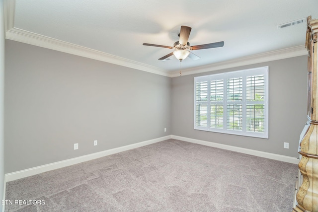 128 Hackberry St, Oak Ridge, TN 37830 - spare room featuring crown molding, a ceiling fan, baseboards, and carpet floors