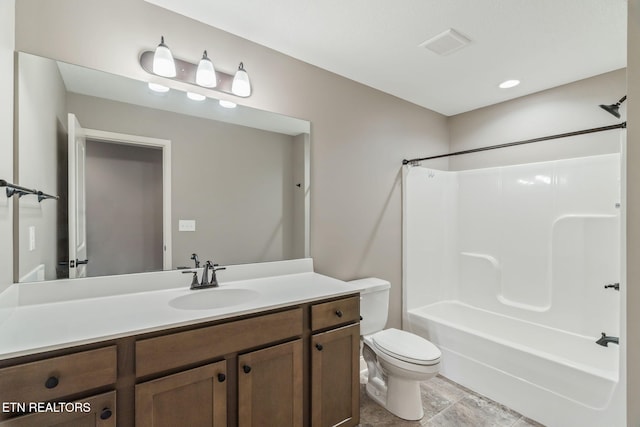 128 Hackberry St, Oak Ridge, TN 37830 - bathroom featuring vanity, tub / shower combination, and toilet