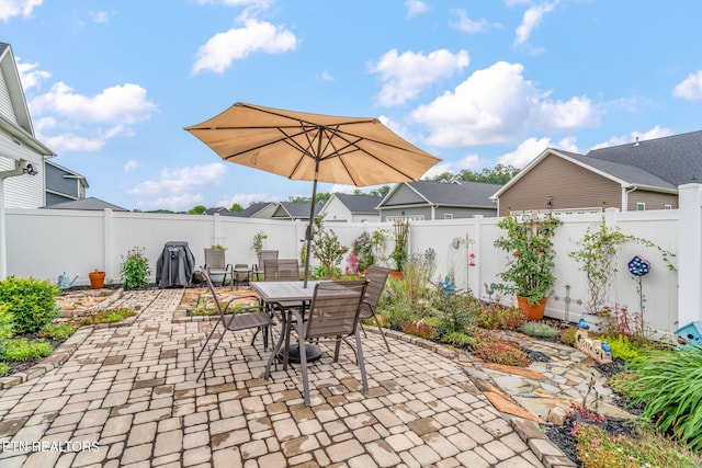 128 Hackberry St, Oak Ridge, TN 37830 - fenced backyard featuring a patio and outdoor dining space
