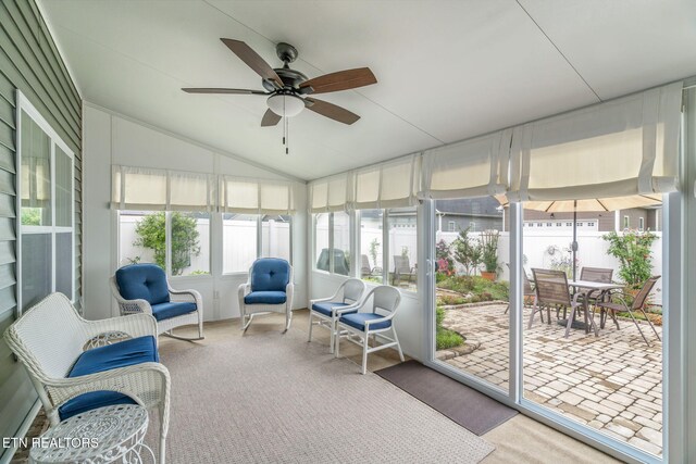 128 Hackberry St, Oak Ridge, TN 37830 - sunroom / solarium with a ceiling fan, vaulted ceiling, and outdoor dining area
