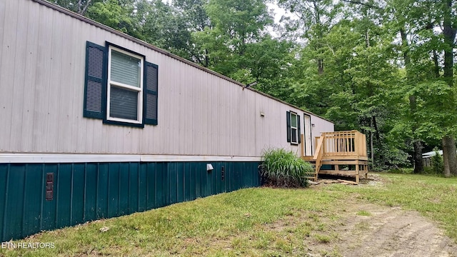 489 Trimmer Ln, Jamestown, TN 38556 - view of side of property with a wooden deck