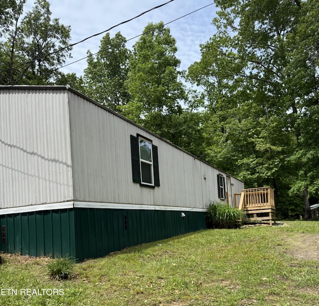489 Trimmer Ln, Jamestown, TN 38556 - view of side of property featuring a wooden deck and a lawn