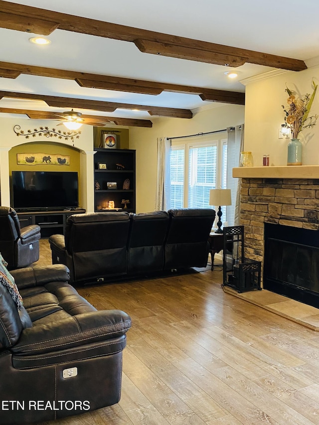 318 Deer Trail Dr, Dandridge, TN 37725 - living area with hardwood / wood-style floors, a stone fireplace, beamed ceiling, ceiling fan, and recessed lighting