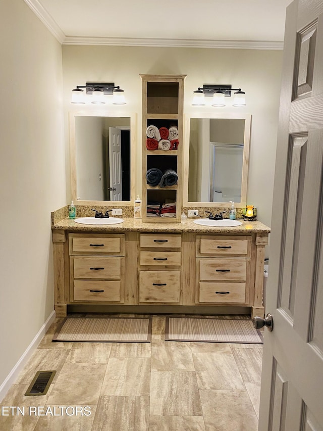 318 Deer Trail Dr, Dandridge, TN 37725 - full bathroom featuring double vanity, crown molding, and baseboards