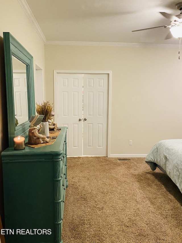 318 Deer Trail Dr, Dandridge, TN 37725 - bedroom with carpet, crown molding, ceiling fan, baseboards, and a closet