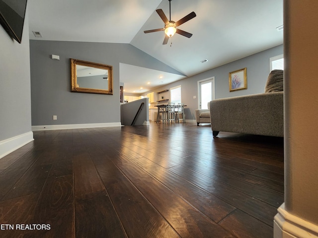 7928 Poplar Grove Ln, Powell, TN 37849 - living area featuring ceiling fan, dark wood-style floors, vaulted ceiling, and baseboards