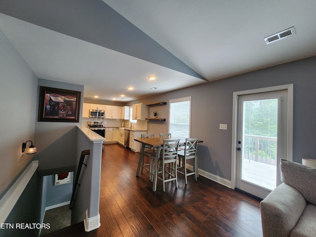 7928 Poplar Grove Ln, Powell, TN 37849 - dining room featuring lofted ceiling, baseboards, dark wood-style floors, and recessed lighting