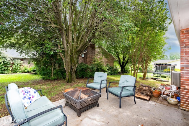 1502 Woodbury Ct, Maryville, TN 37803 - view of patio / terrace with a trampoline, an outdoor fire pit, and central AC unit
