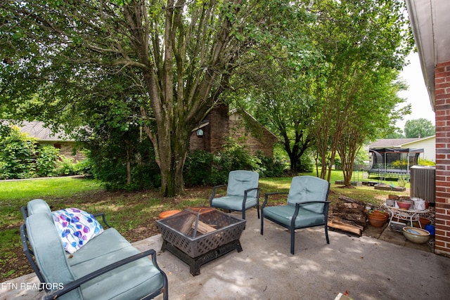 1502 Woodbury Ct, Maryville, TN 37803 - view of patio with a trampoline and an outdoor fire pit