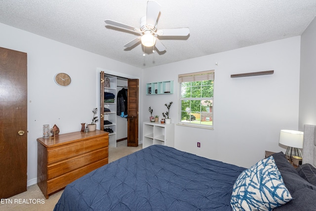 1502 Woodbury Ct, Maryville, TN 37803 - bedroom with light colored carpet, ceiling fan, and a textured ceiling