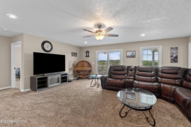 2055 Scott St, Sevierville, TN 37876 - living room with a ceiling fan, carpet, recessed lighting, baseboards, and a textured ceiling