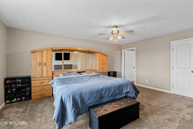 2055 Scott St, Sevierville, TN 37876 - bedroom featuring carpet flooring, baseboards, a textured ceiling, and ceiling fan