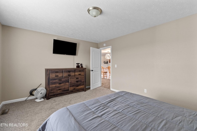 2055 Scott St, Sevierville, TN 37876 - bedroom featuring carpet, baseboards, and a textured ceiling