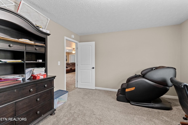 2055 Scott St, Sevierville, TN 37876 - home office with carpet, a textured ceiling, and baseboards