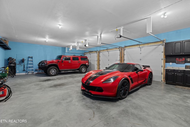 2055 Scott St, Sevierville, TN 37876 - garage featuring a garage door opener