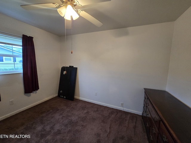 288 Machine Branch Rd, Ewing, VA 24248 - empty room with a ceiling fan, dark carpet, and baseboards