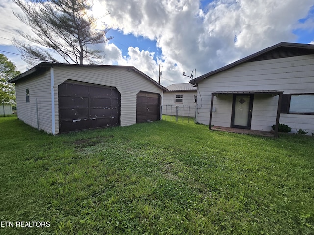 288 Machine Branch Rd, Ewing, VA 24248 - view of yard featuring a garage and an outdoor structure