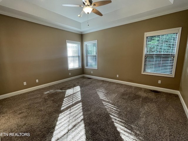103 Crossroads Blvd, Oak Ridge, TN 37830 - spare room with carpet flooring, ceiling fan, a tray ceiling, baseboards, and crown molding