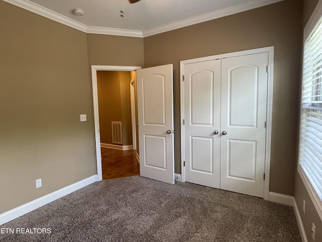 103 Crossroads Blvd, Oak Ridge, TN 37830 - unfurnished bedroom featuring carpet floors, crown molding, a closet, and baseboards