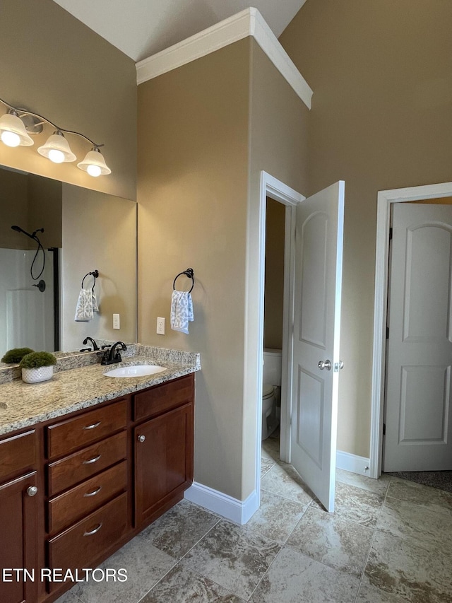 103 Crossroads Blvd, Oak Ridge, TN 37830 - full bathroom with vanity, baseboards, toilet, and ornamental molding
