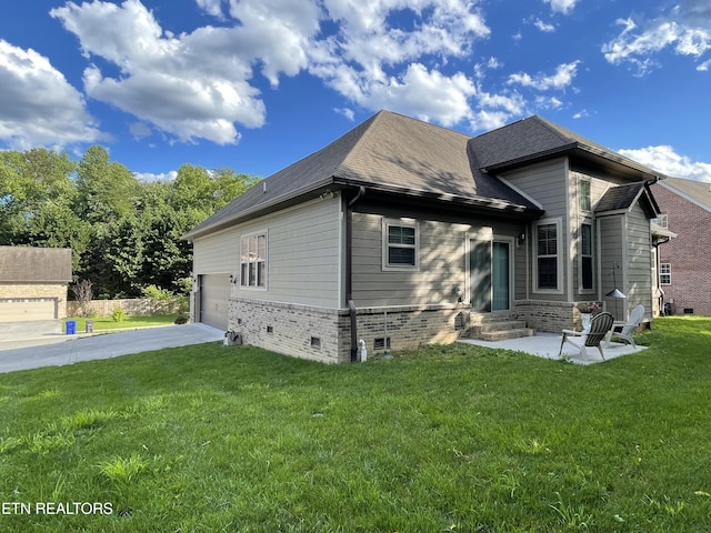 103 Crossroads Blvd, Oak Ridge, TN 37830 - rear view of property featuring asphalt driveway, a lawn, entry steps, and brick siding