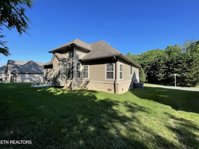 103 Crossroads Blvd, Oak Ridge, TN 37830 - view of home's exterior with a lawn, central AC, and crawl space