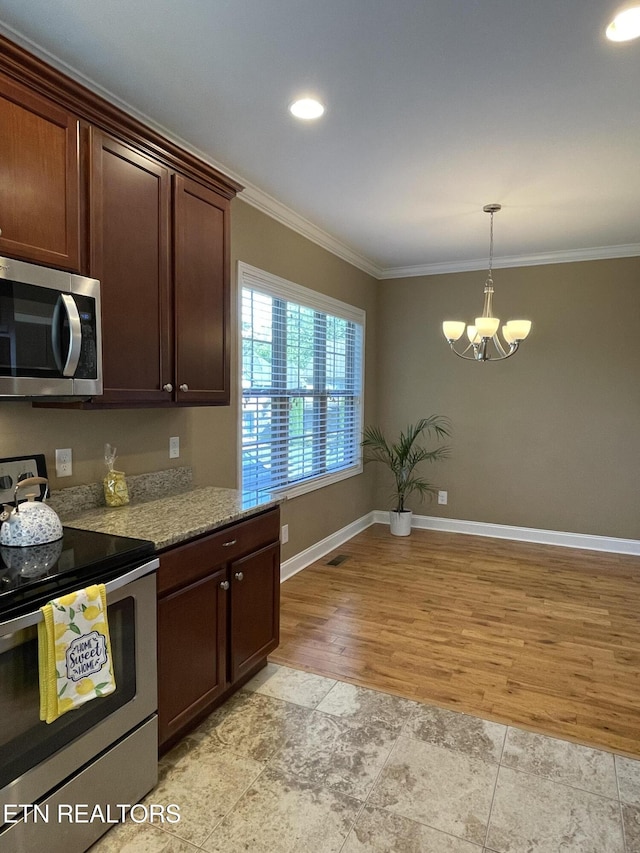 103 Crossroads Blvd, Oak Ridge, TN 37830 - kitchen with appliances with stainless steel finishes, ornamental molding, a chandelier, hanging light fixtures, and light stone counters
