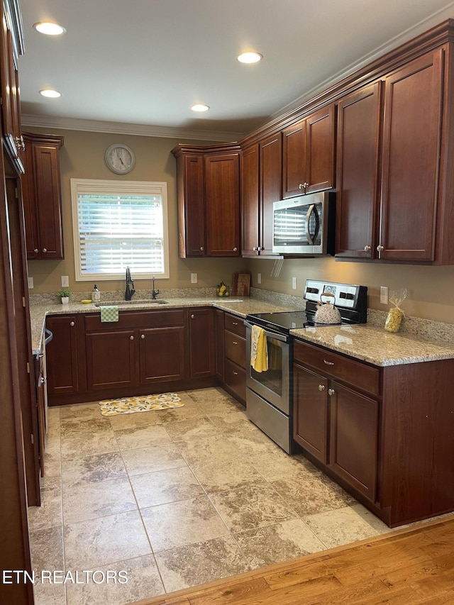 103 Crossroads Blvd, Oak Ridge, TN 37830 - kitchen featuring stainless steel appliances, ornamental molding, a sink, recessed lighting, and light stone counters