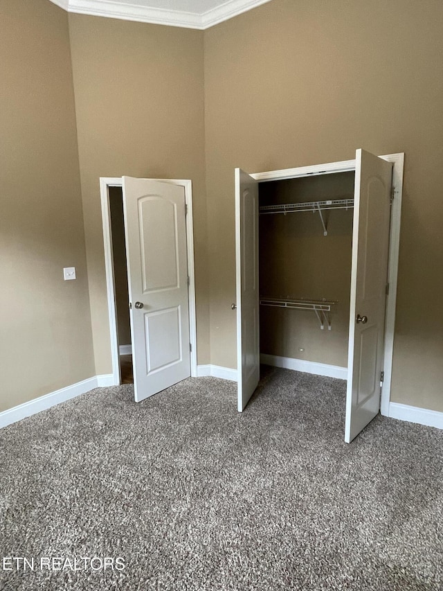 103 Crossroads Blvd, Oak Ridge, TN 37830 - unfurnished bedroom with carpet flooring, baseboards, a closet, crown molding, and a high ceiling
