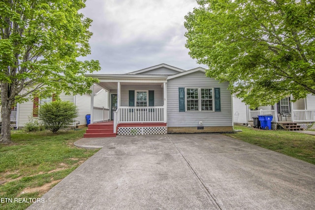 1713 Sails Way, Knoxville, TN 37932 - view of front of house featuring covered porch, crawl space, and a front yard