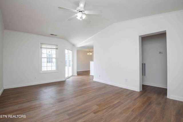 1713 Sails Way, Knoxville, TN 37932 - spare room with a chandelier, lofted ceiling, dark wood-type flooring, ceiling fan, and baseboards