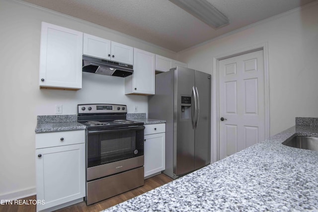 1713 Sails Way, Knoxville, TN 37932 - kitchen featuring stainless steel appliances, under cabinet range hood, dark wood-type flooring, white cabinets, and ornamental molding