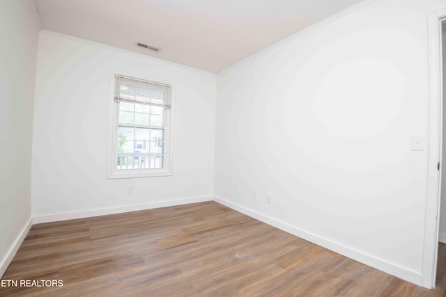 1713 Sails Way, Knoxville, TN 37932 - empty room featuring ornamental molding, wood finished floors, and baseboards
