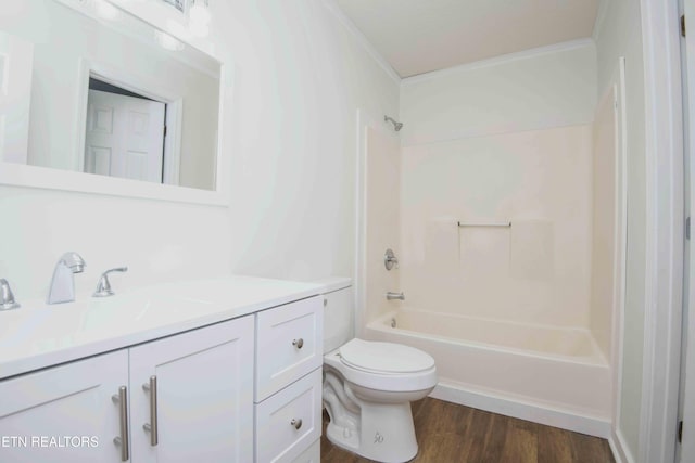 1713 Sails Way, Knoxville, TN 37932 - bathroom featuring ornamental molding, vanity, toilet,  shower combination, and wood finished floors