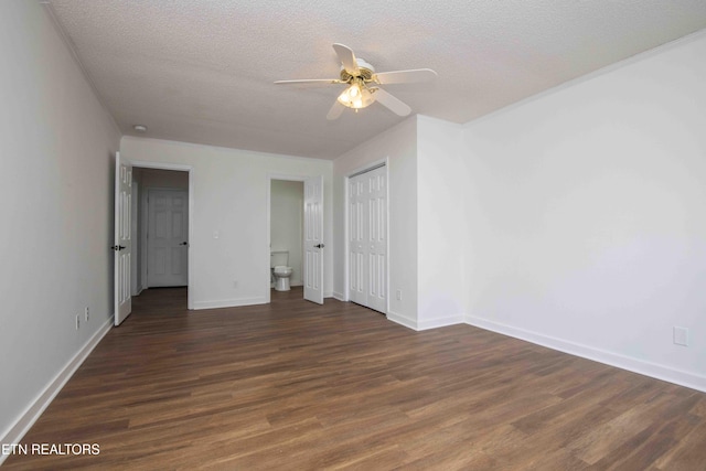 1713 Sails Way, Knoxville, TN 37932 - unfurnished bedroom with wood finished floors, baseboards, a textured ceiling, ceiling fan, and a closet