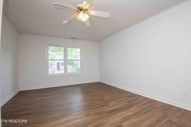 1713 Sails Way, Knoxville, TN 37932 - empty room featuring dark wood-style flooring, ceiling fan, baseboards, and a textured ceiling