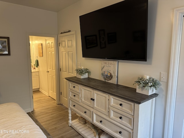 740 Sterchi Park Way Unit F7, Knoxville, TN 37912 - bedroom with light wood-style flooring and ensuite bath