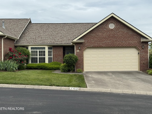 740 Sterchi Park Way Unit F7, Knoxville, TN 37912 - view of front facade with brick siding, driveway, and a shingled roof