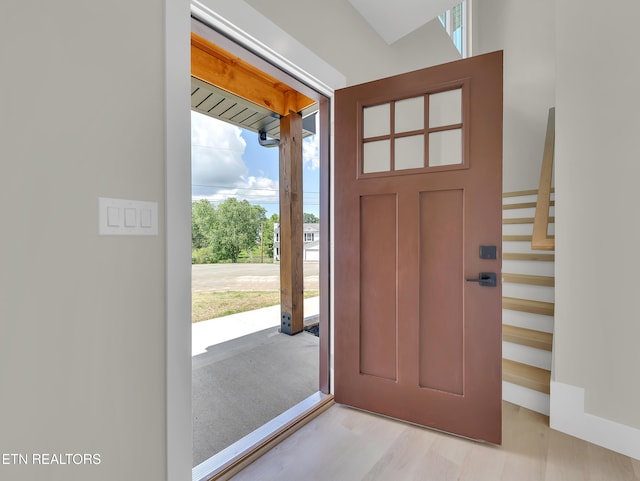 7747 Drawbridge Ct, Powell, TN 37849 - entrance foyer with plenty of natural light, wood finished floors, and stairway