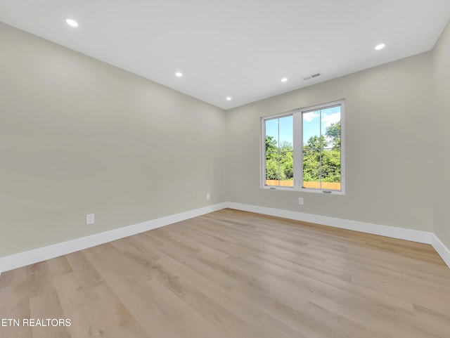 7747 Drawbridge Ct, Powell, TN 37849 - unfurnished room with baseboards, recessed lighting, and light wood-style flooring