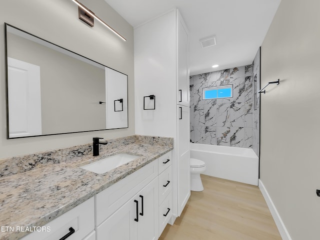 7747 Drawbridge Ct, Powell, TN 37849 - full bath with vanity, toilet, wood finished floors, shower / bathtub combination, and recessed lighting