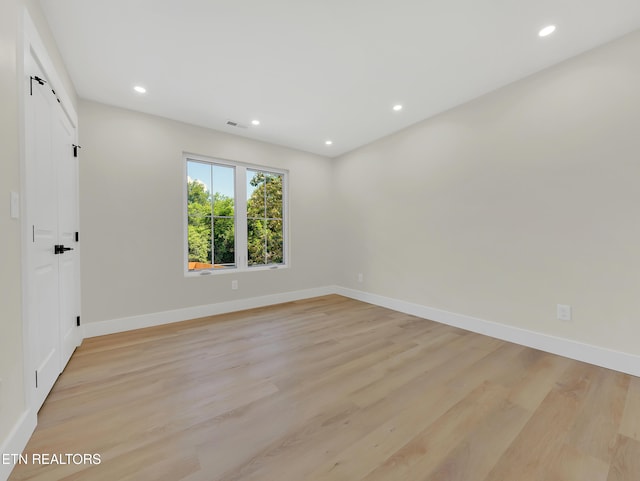 7747 Drawbridge Ct, Powell, TN 37849 - spare room with recessed lighting, light wood-style flooring, and baseboards