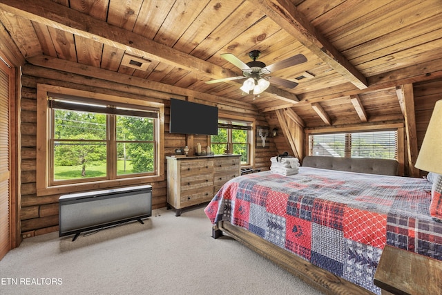 3509 Ginseng Way, Sevierville, TN 37862 - bedroom with wood ceiling with exposed beams, log walls, and carpet floors